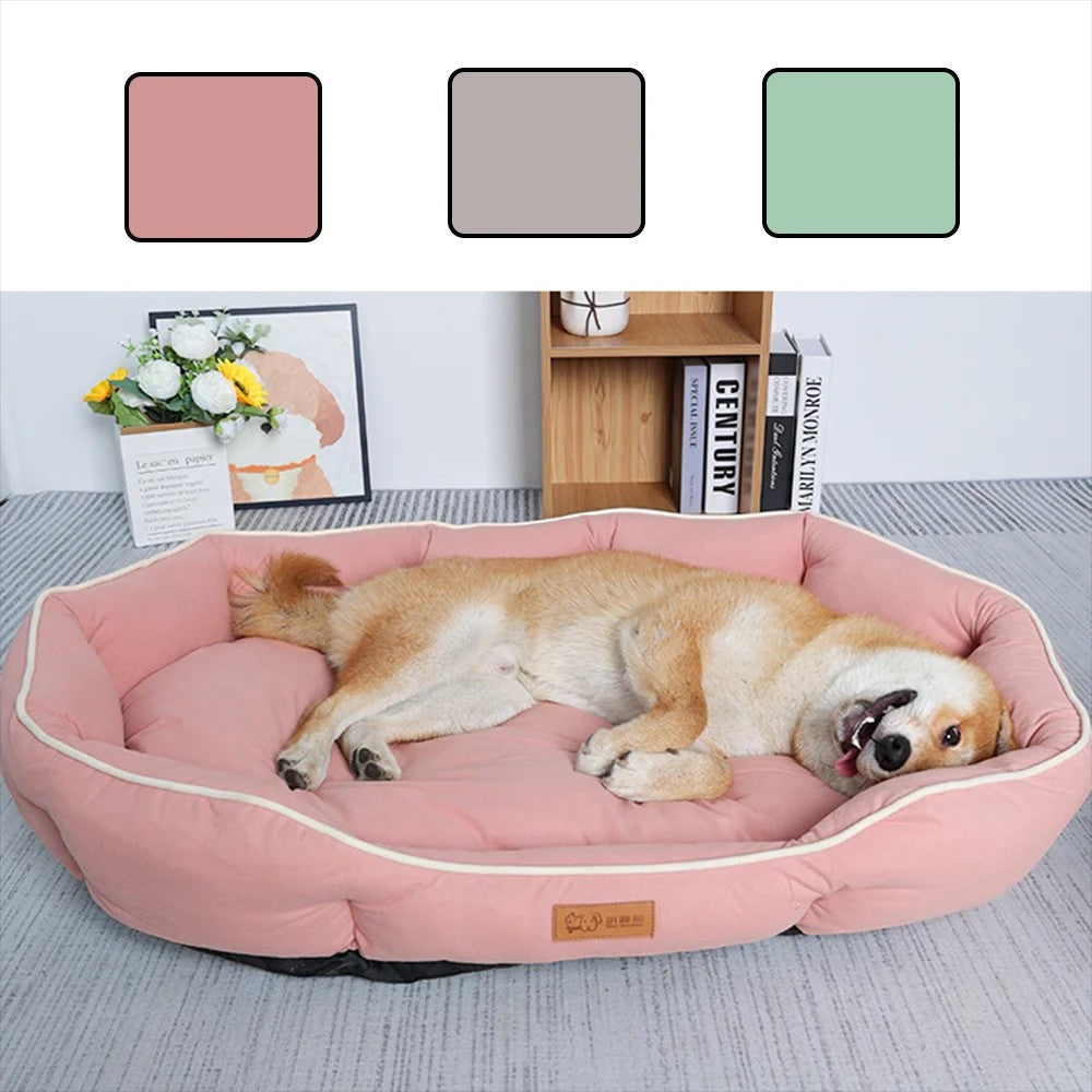 Canapé-lit Pelorie rose pour chien, grand format confortable permettant à l'animal de s'étendre complètement.