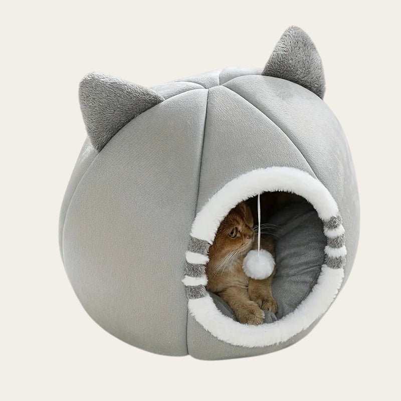 Niche pour chat Pelorie grise en forme de maisonnette avec oreilles et pompon suspendu pour un confort douillet